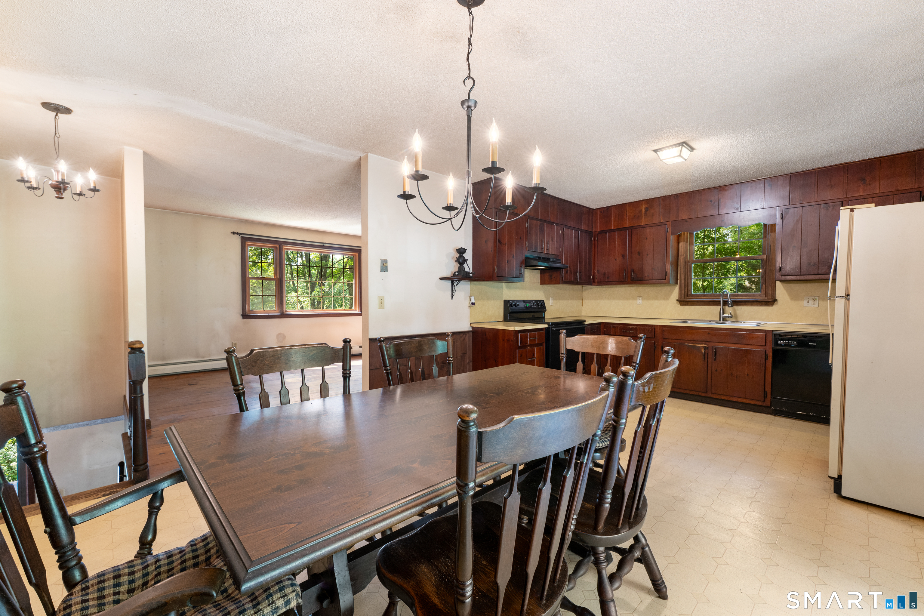 35 Pigeon Swamp Road, Unit 2 Lebanon, CT 06249 - Photo 20 of 35 a view of a dining room with furniture window and wooden floor