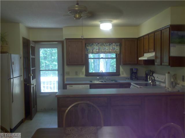 205 Mersey Road Greensboro, NC 27406 - Photo 2 of 12 Kitchen. Extra large country kitchen with eat-in area and large walk-in pantry