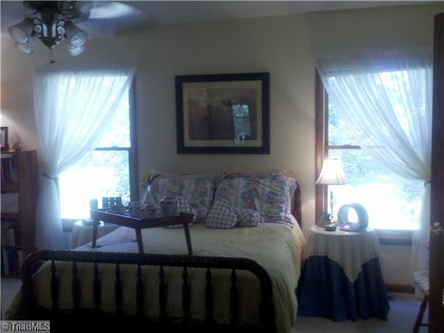 205 Mersey Road Greensboro, NC 27406 - Photo 8 of 12 In-Law Suite. Bedroom features an expansive walk-in-closet (handicap accessible)