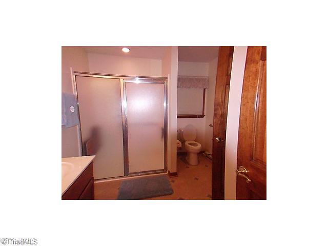 205 Mersey Road Greensboro, NC 27406 - Photo 9 of 12 In-Law Suite. Zero entry shower in the apartment bathroom