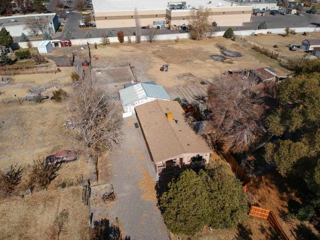 2908 East 7/8 Road Grand Junction, CO 81504 - Photo 4 of 26 an aerial view of residential houses with outdoor space