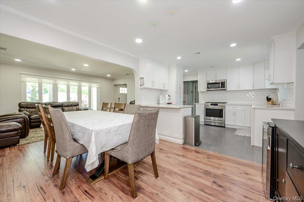 534 Allen Road Woodmere, NY 11598 - Photo 7 of 35 a view of kitchen with cabinets table and chairs