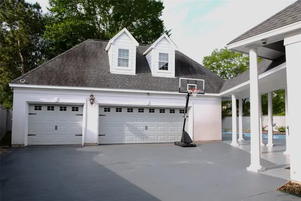 a view of a house with a garage