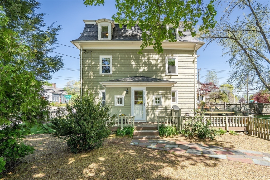 83 Ames Street Dedham, MA 02026 - Photo 1 of 33 front view of a house with a porch