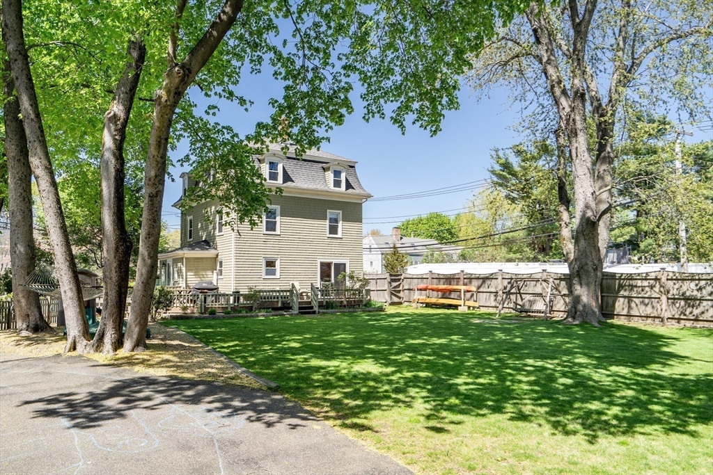 83 Ames Street Dedham, MA 02026 - Photo 30 of 33 a front view of a house with a yard