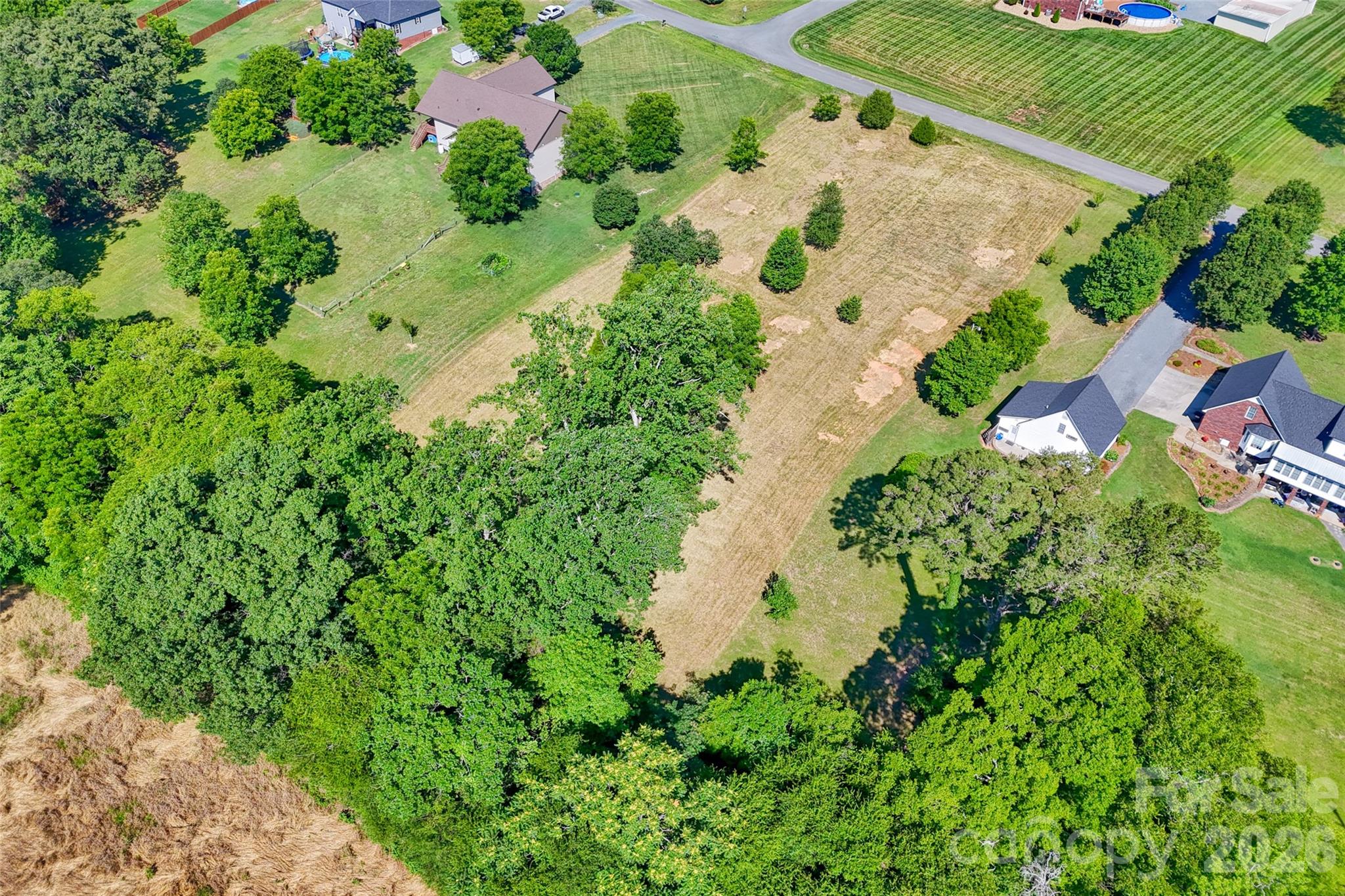 Lot 3 Crepts Branch Road, Unit 3 Locust, NC 28097 - Photo 10 of 36 an aerial view of residential house with outdoor space and trees all around
