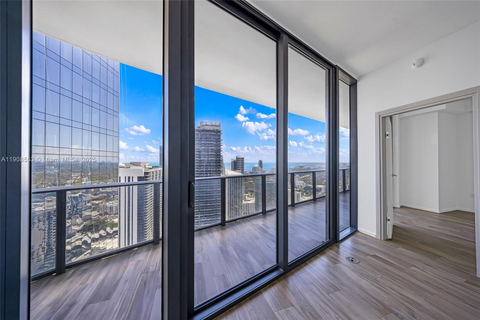 801 South Miami Avenue, Unit 5204 Miami, FL 33131 - Photo 11 of 31 a view of a living room with a large window