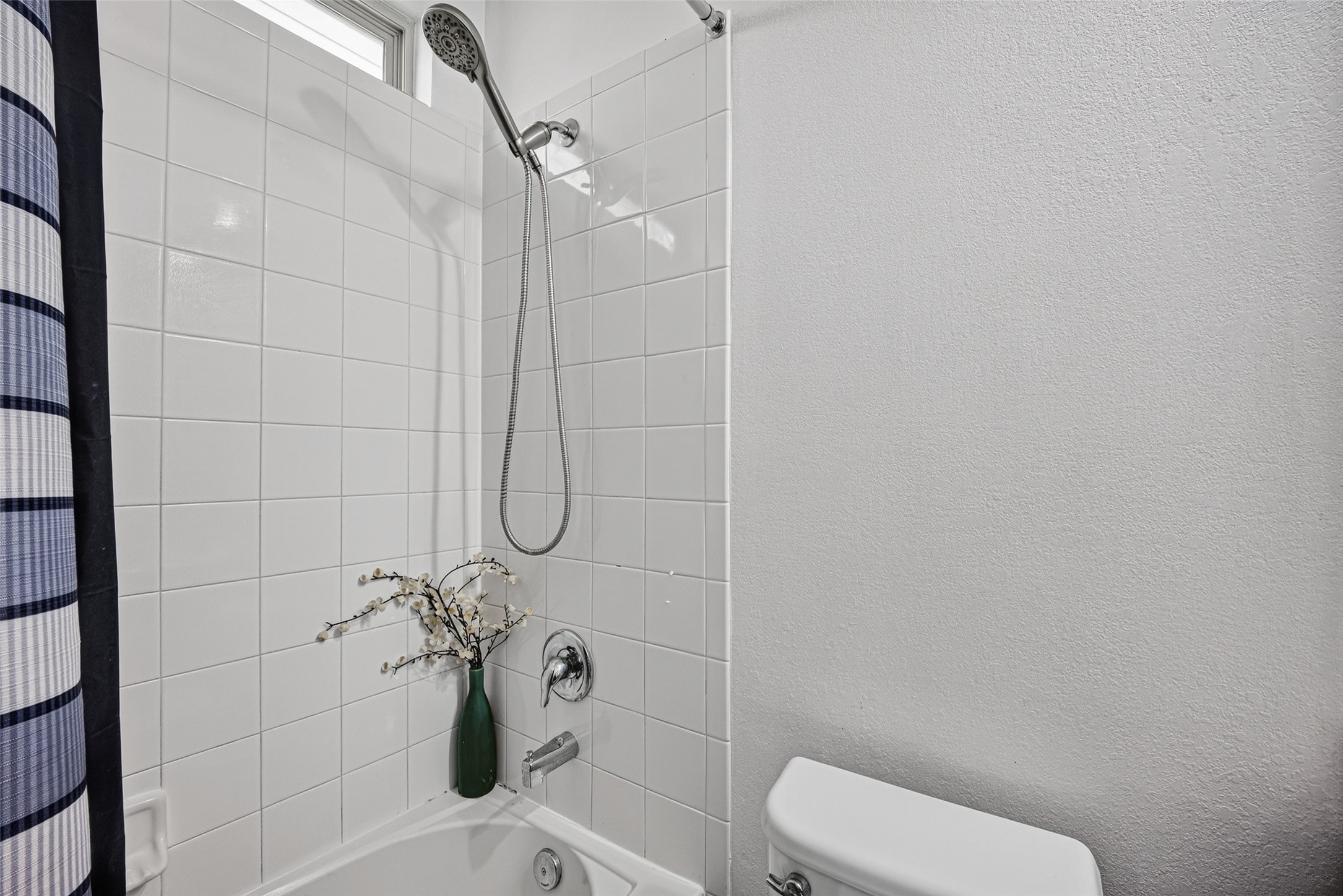 9314 Fuqua Ridge Lane Houston, TX 77075 - Photo 16 of 24 a bathroom with a toilet and shower