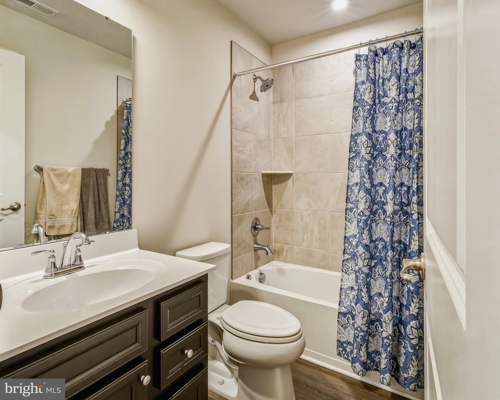 36 Continental Boulevard Sicklerville, NJ 08081 - Photo 21 of 25 a bathroom with a sink toilet and shower