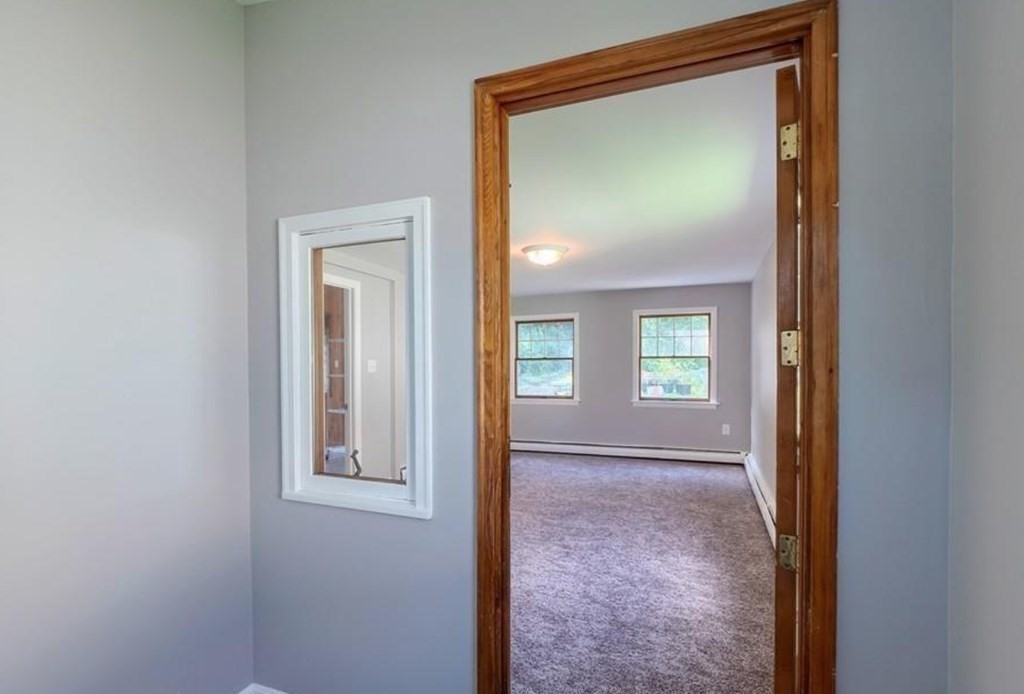 142 East Meadow Road Lowell, MA 01854 - Photo 4 of 28 a view of hallway with front door