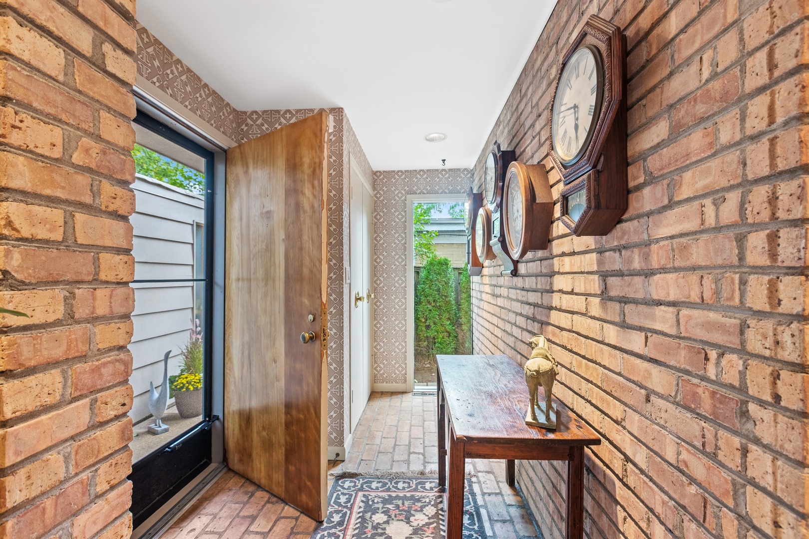 258 Wagner Road Northfield, IL 60093 - Photo 2 of 17 a view of balcony with two chairs and a potted plant
