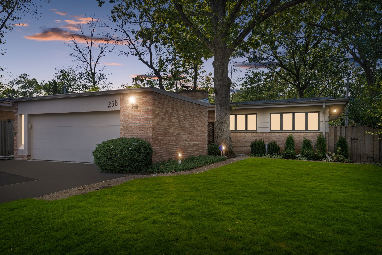258 Wagner Road Northfield, IL 60093 - Photo 15 of 17 a view of an house with backyard space and garden