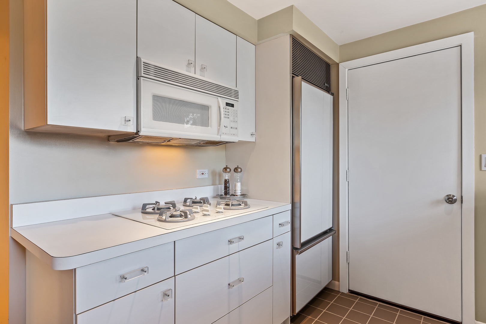 258 Wagner Road Northfield, IL 60093 - Photo 6 of 17 a kitchen with a sink cabinets and stainless steel appliances