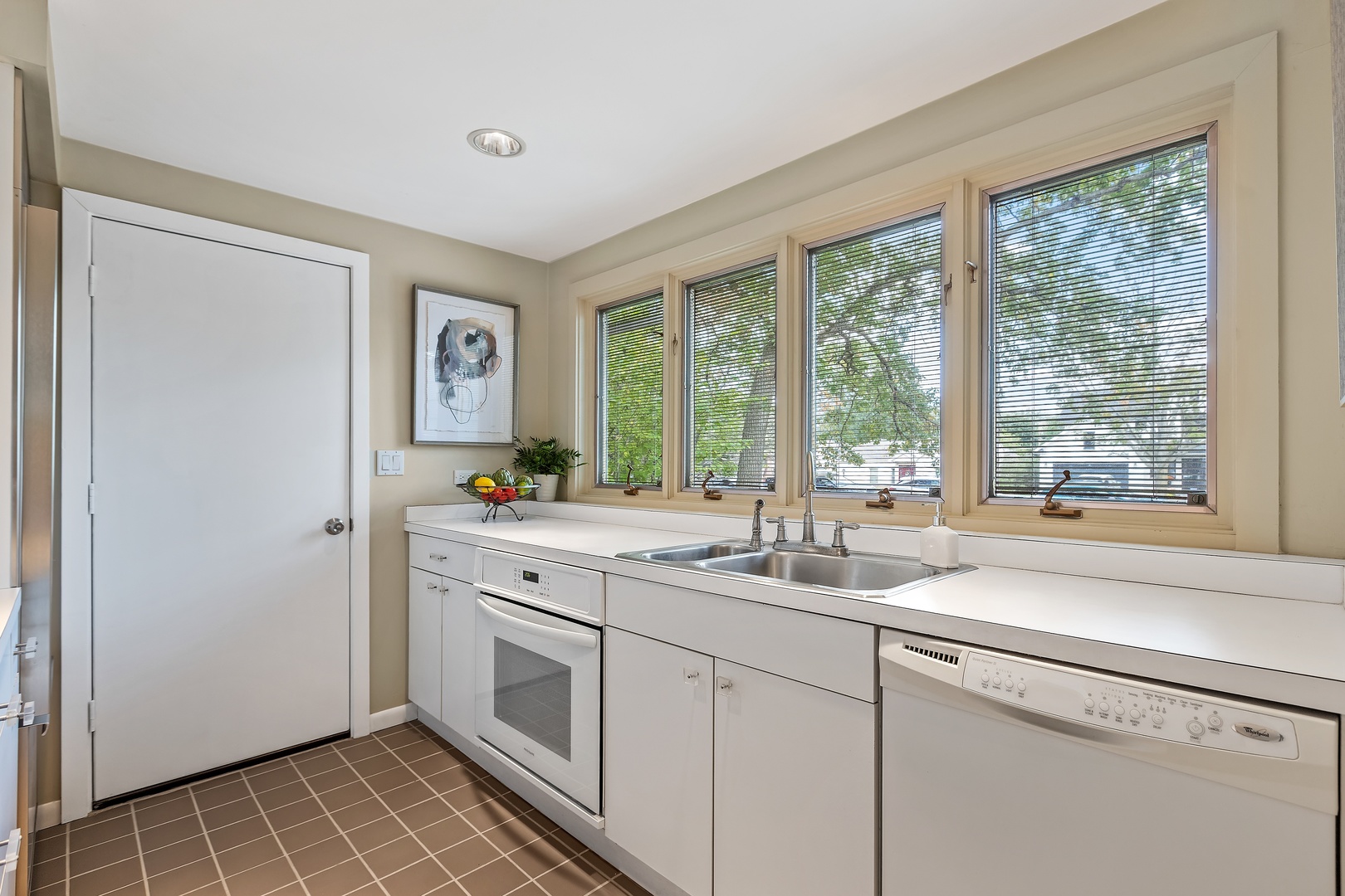 258 Wagner Road Northfield, IL 60093 - Photo 8 of 17 a kitchen with a sink and large window