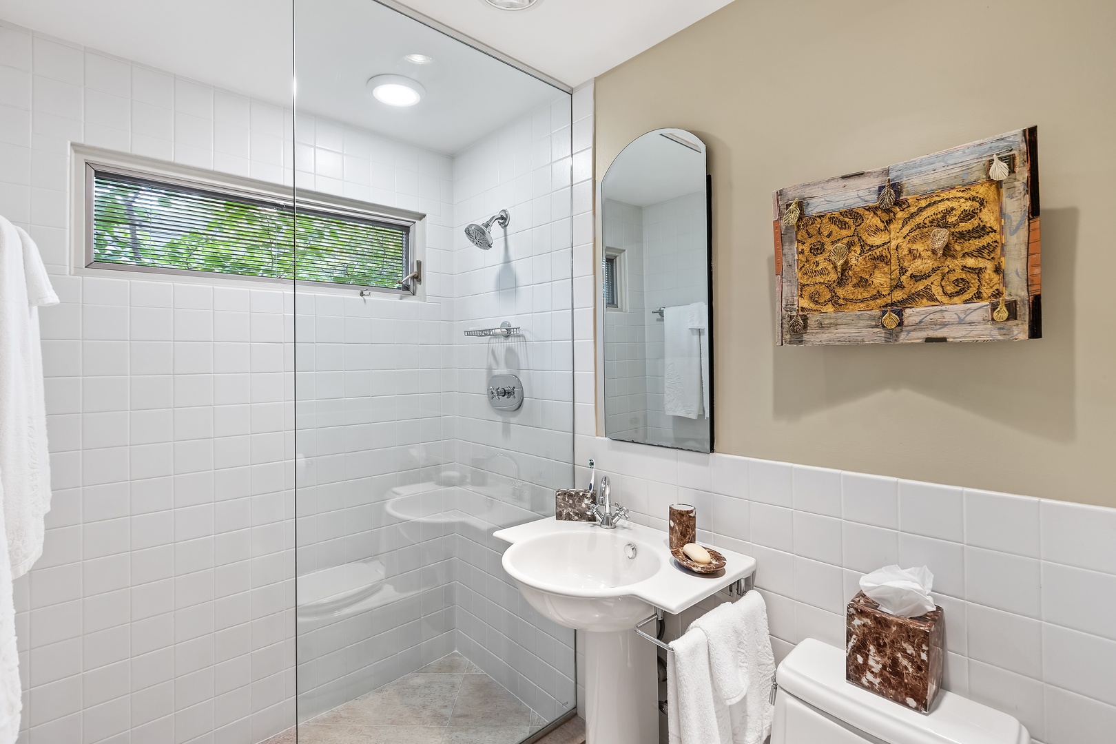 258 Wagner Road Northfield, IL 60093 - Photo 10 of 17 a bathroom with a sink and mirror with toilet