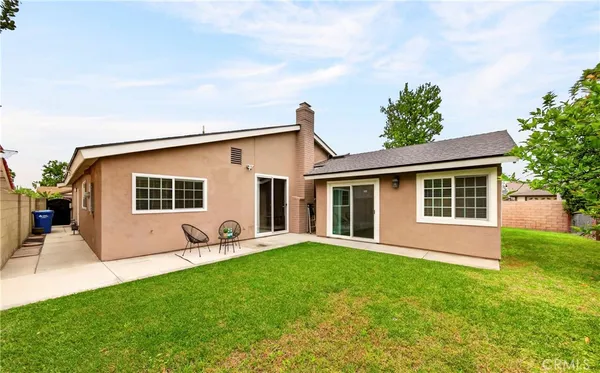 a house view with a garden space