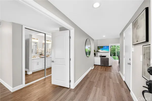 a bathroom with a granite countertop sink mirror and a
