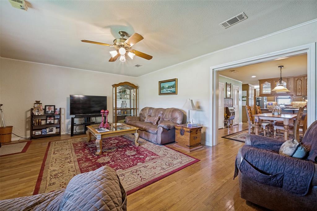 117 County Road Decatur, TX 76234 - Photo 8 of 40 Hardwood flooring throughout, recessed lighting, and a ceiling fan with light fixture
