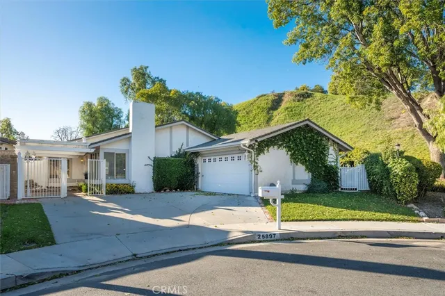 a house view with a garden space