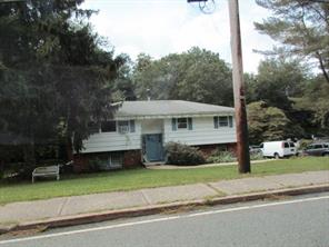 249 Hempstead Road Spring Valley, NY 10977 - Photo 1 of 1 a front view of a house with a garden