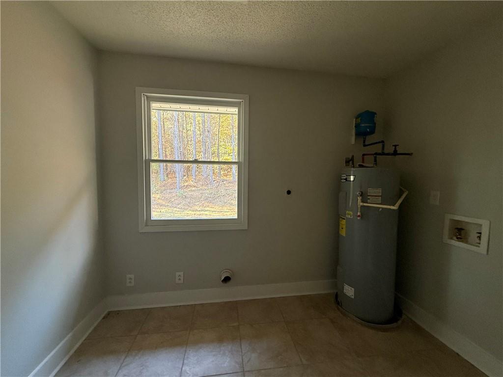 774 Mill Road McDonough, GA 30253 - Photo 26 of 37 an empty room with a window