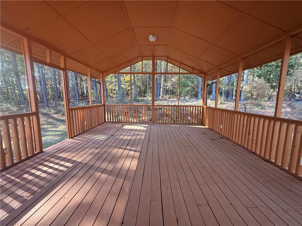 774 Mill Road McDonough, GA 30253 - Photo 31 of 37 an empty room with wooden floor and windows