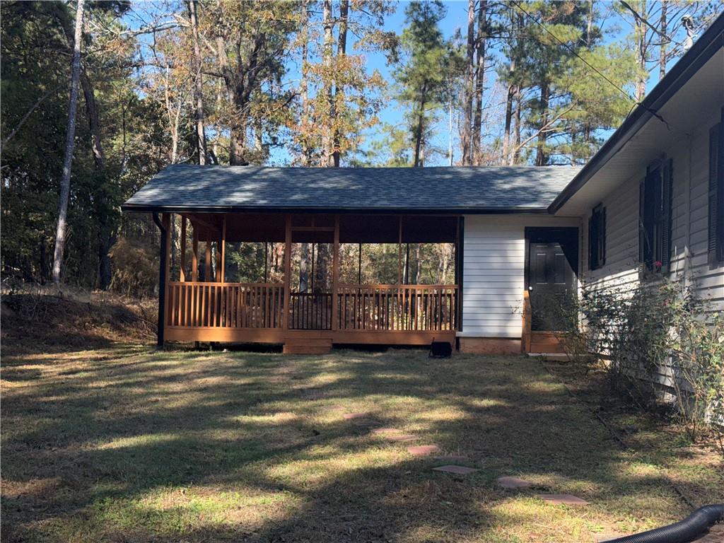 774 Mill Road McDonough, GA 30253 - Photo 33 of 37 a view of a house with a yard