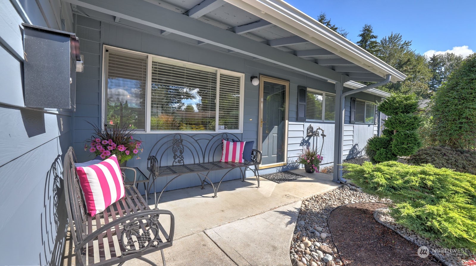 4324 Northeast 11th Street Renton, WA 98059 - Photo 3 of 22 a view of a lounge chairs in the porch