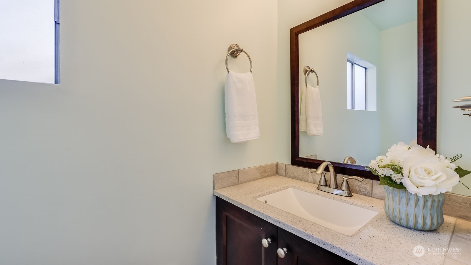 4324 Northeast 11th Street Renton, WA 98059 - Photo 10 of 22 a bathroom with a sink vanity and mirror