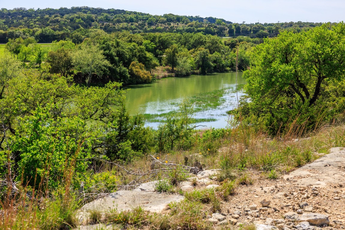 Lot 2 Byrd Ranch Road Johnson City, TX 78636 - Photo 11 of 40 a view of a lake with top of house