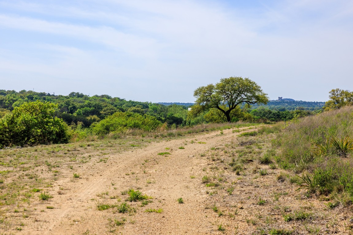 Lot 2 Byrd Ranch Road Johnson City, TX 78636 - Photo 20 of 40 a view of a dry yard with wooden fence