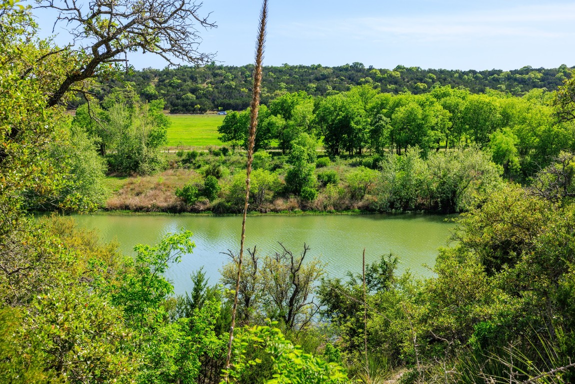 Lot 2 Byrd Ranch Road Johnson City, TX 78636 - Photo 9 of 40 a view of a lake with a big yard