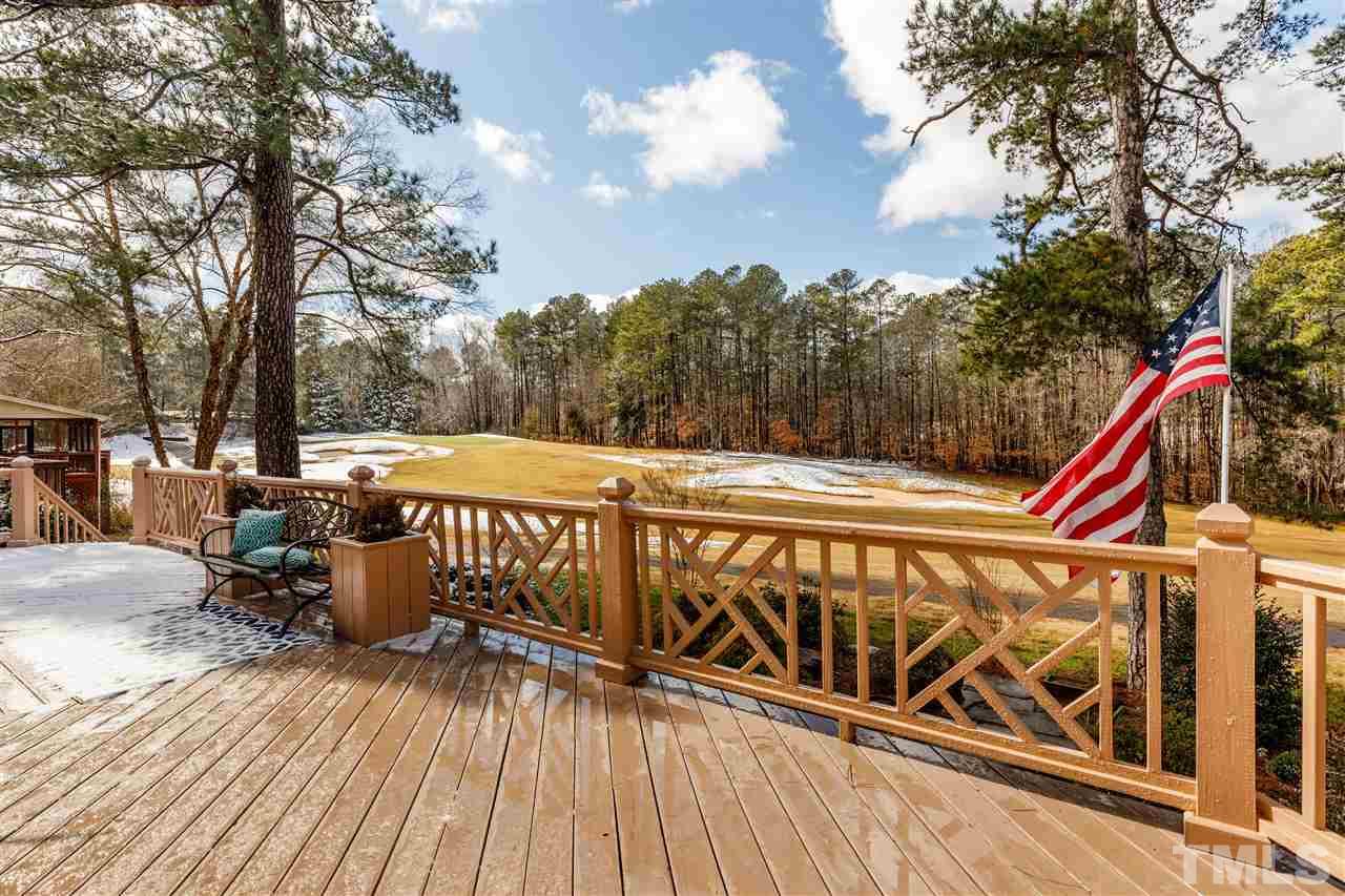 2968 Tillinghast Trail Raleigh, NC 27613 - Photo 2 of 28 a view of outdoor space with furniture and wooden deck