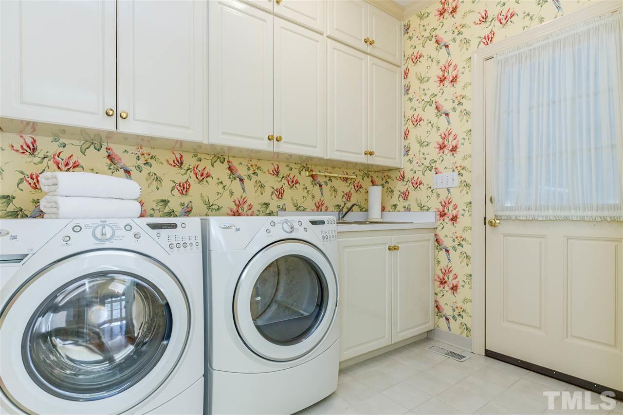 2968 Tillinghast Trail Raleigh, NC 27613 - Photo 17 of 28 a utility room with dryer and washer