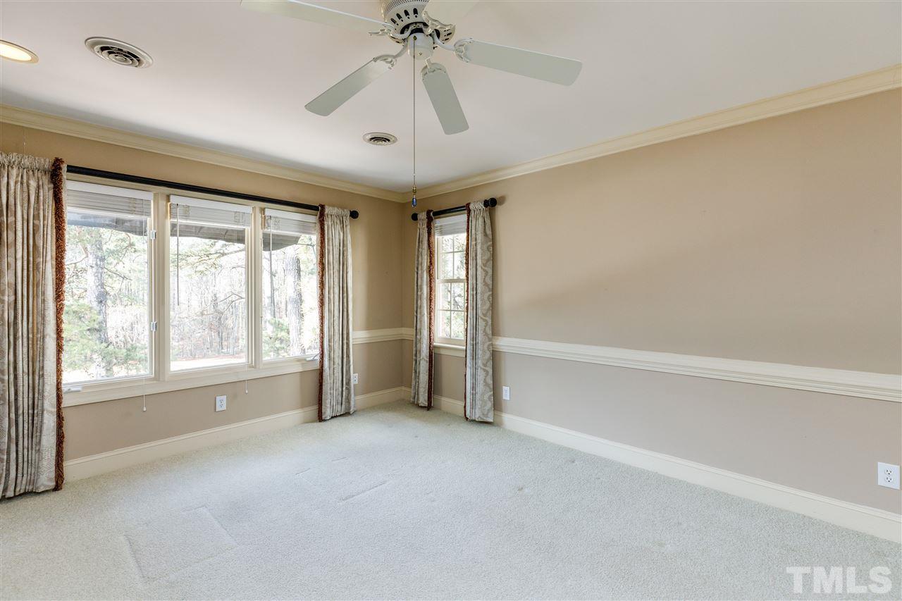 2968 Tillinghast Trail Raleigh, NC 27613 - Photo 18 of 28 a view of an empty room with a window
