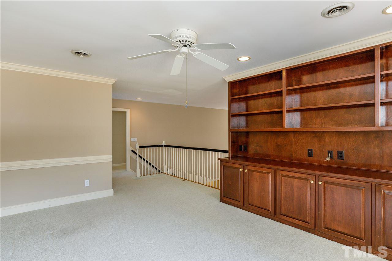 2968 Tillinghast Trail Raleigh, NC 27613 - Photo 19 of 28 a view of an empty room with a cabinet