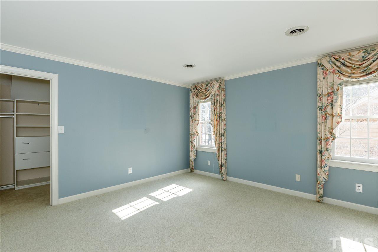 2968 Tillinghast Trail Raleigh, NC 27613 - Photo 20 of 28 an empty room with windows