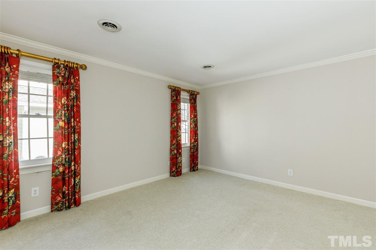 2968 Tillinghast Trail Raleigh, NC 27613 - Photo 22 of 28 a view of an empty room with a window