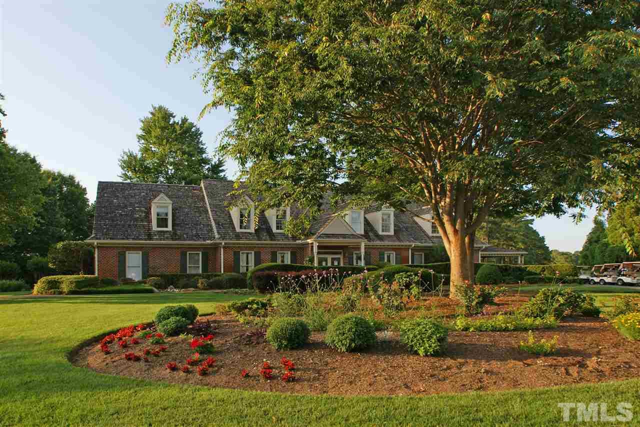 2968 Tillinghast Trail Raleigh, NC 27613 - Photo 24 of 28 a front view of a house with a garden