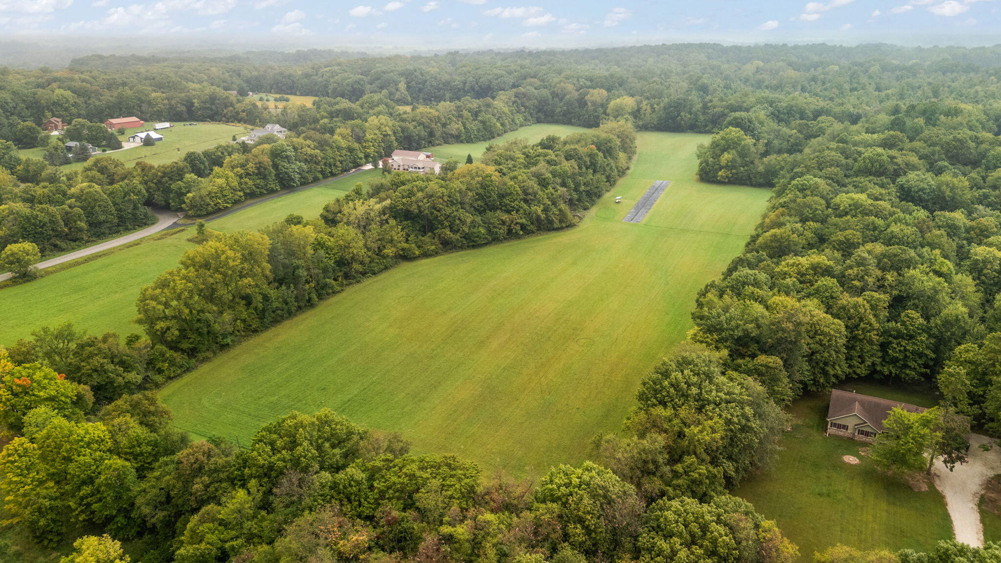 a view of a lake with a houses