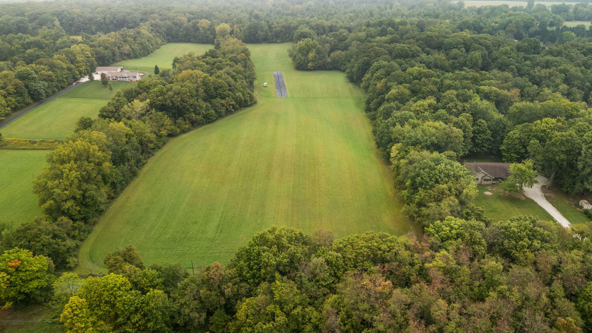 0 North Goldring Road La Porte, IN 46350 - Photo 2 of 7 a large body of water with top of house