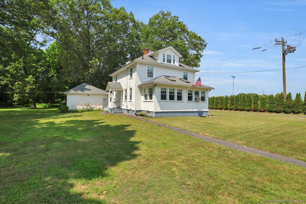 100 Adams Road Bloomfield, CT 06002 - Photo 1 of 1 a house view with swimming pool