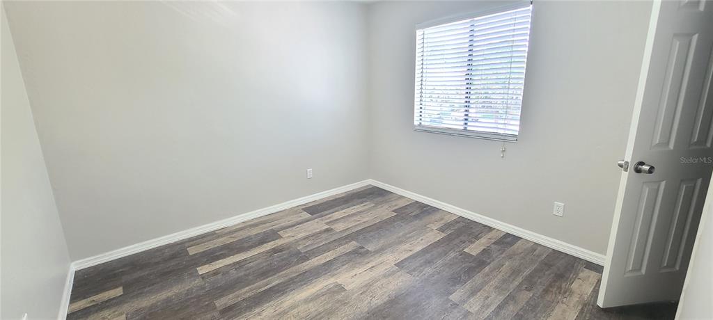 1304 Deer Springs Road Port Orange, FL 32129 - Photo 18 of 37 an empty room with a window