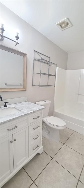 1304 Deer Springs Road Port Orange, FL 32129 - Photo 24 of 37 a bathroom with a sink a toilet and bathtub