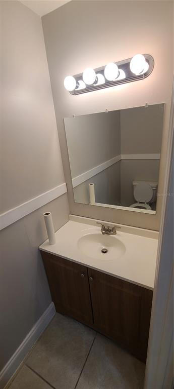 1304 Deer Springs Road Port Orange, FL 32129 - Photo 29 of 37 a bathroom with a sink and mirror