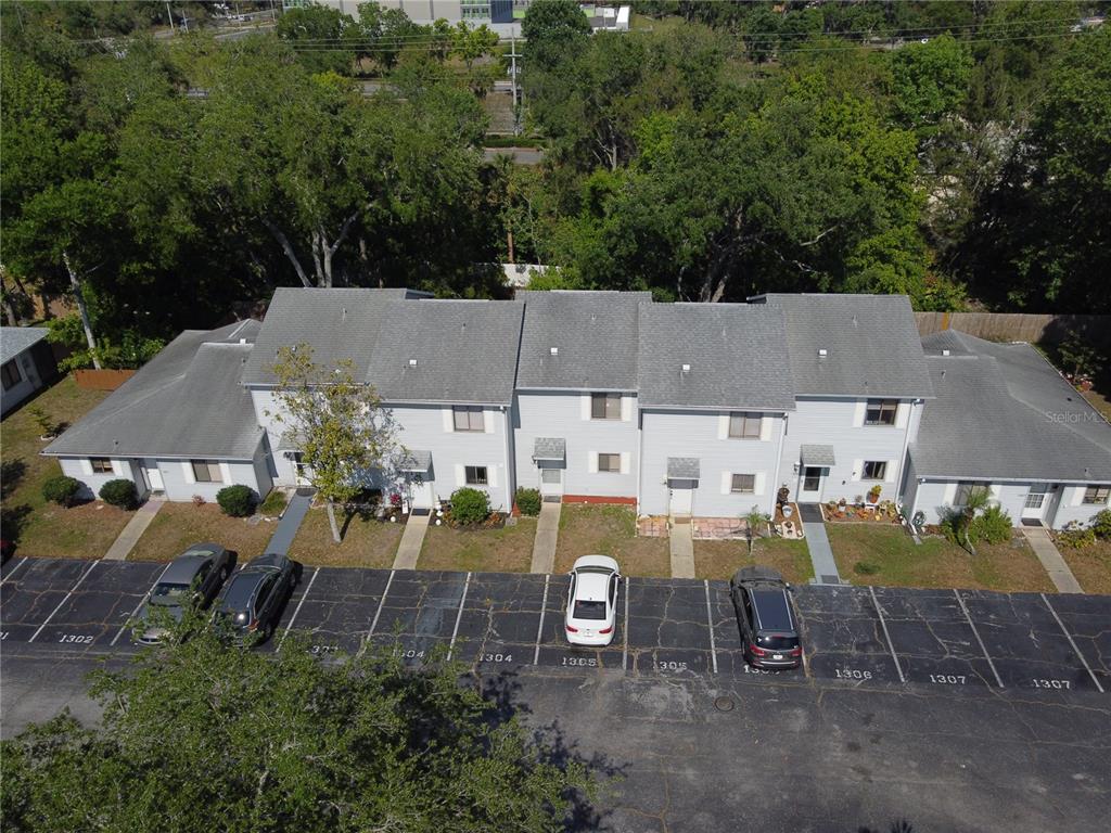 1304 Deer Springs Road Port Orange, FL 32129 - Photo 37 of 37 an aerial view of a house with outdoor space and trees all around
