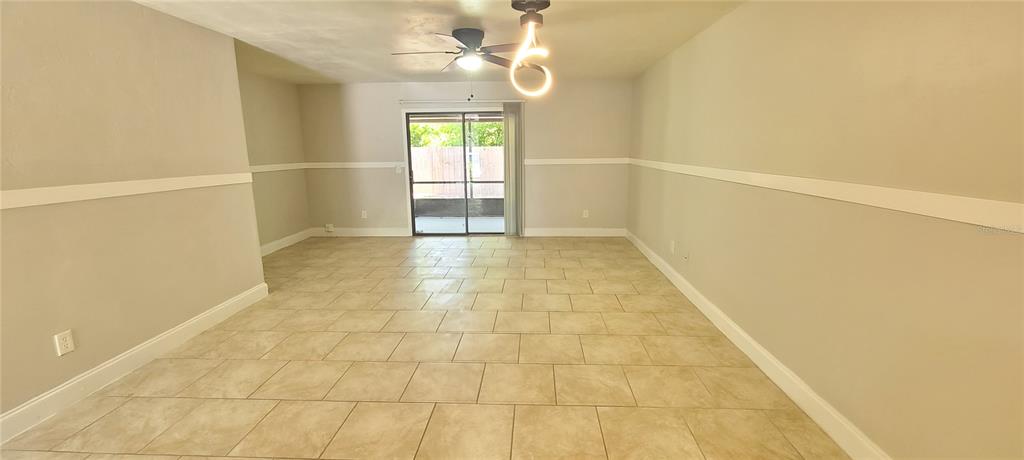 1304 Deer Springs Road Port Orange, FL 32129 - Photo 5 of 37 a view of an empty room with a window
