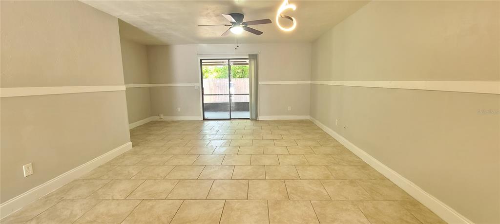 1304 Deer Springs Road Port Orange, FL 32129 - Photo 6 of 37 a view of an empty room with a window