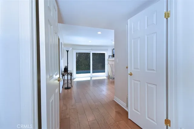 a view of entryway with wooden floor