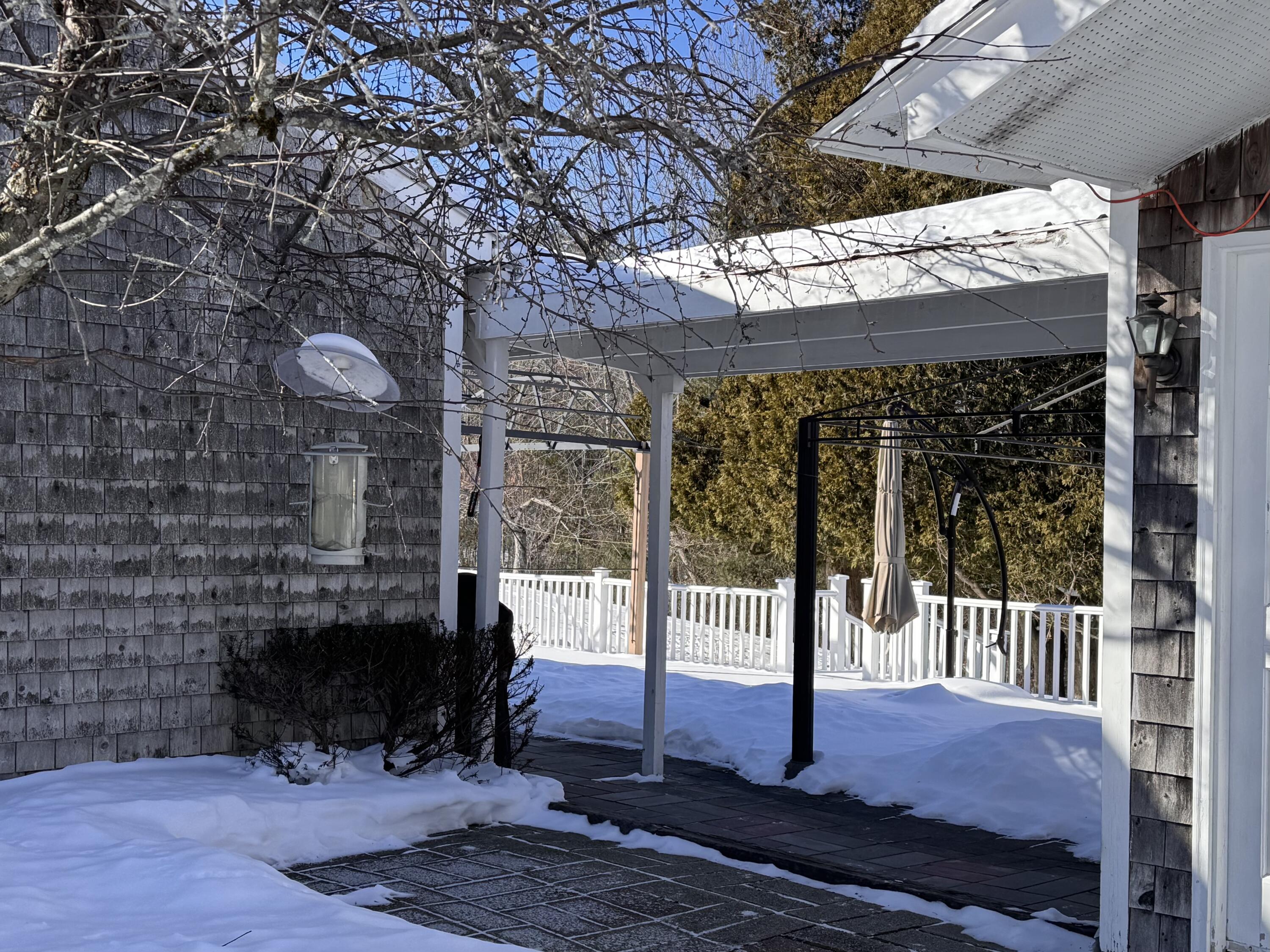 679 Neck Road China, ME 04358 - Photo 3 of 23 covered walkway from garage to house